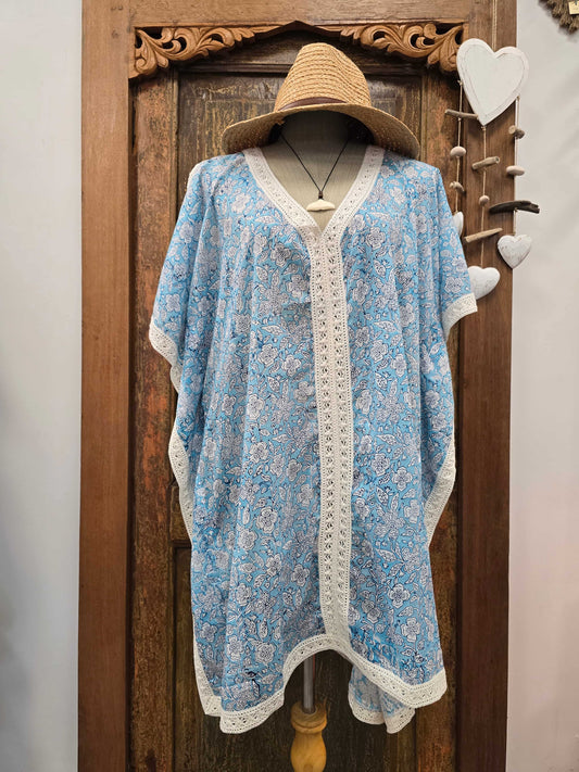 Paloma kaftan on model showing front with raffia hat